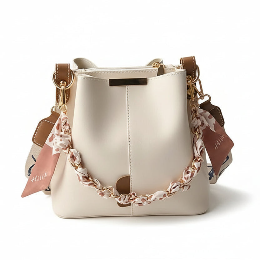 Nuevo bolso de hombro a la moda para mujer, bolso tipo cubo con cadena de cinta de gran capacidad, bolso cruzado para desplazamientos diarios