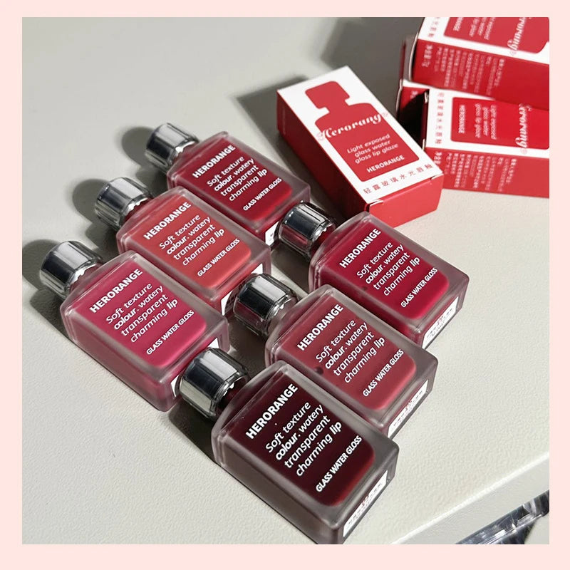 HERORANGE Laca de labios ligera similar al vidrio: brillo de espejo, fórmula hidratante; A prueba de manchas, de larga duración y brillo de la piel